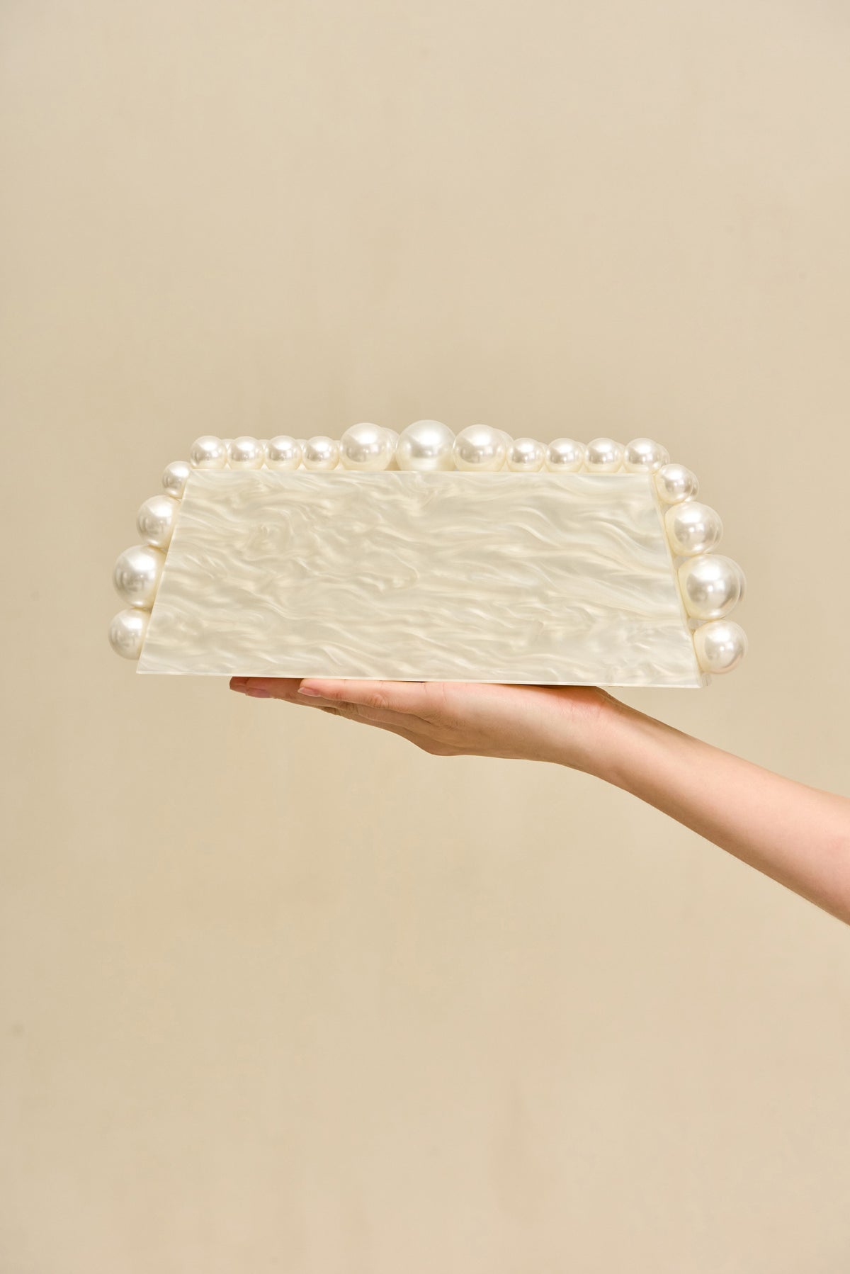 EOS LUNGO CLUTCH - IVORY